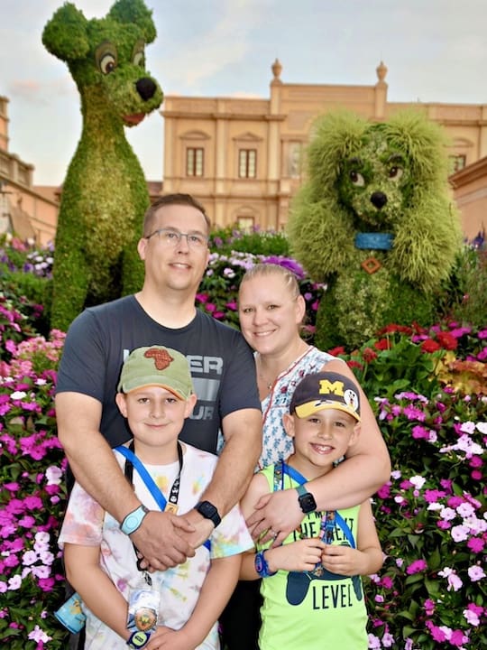 Chrystal Harris and fam epcot flower and garden